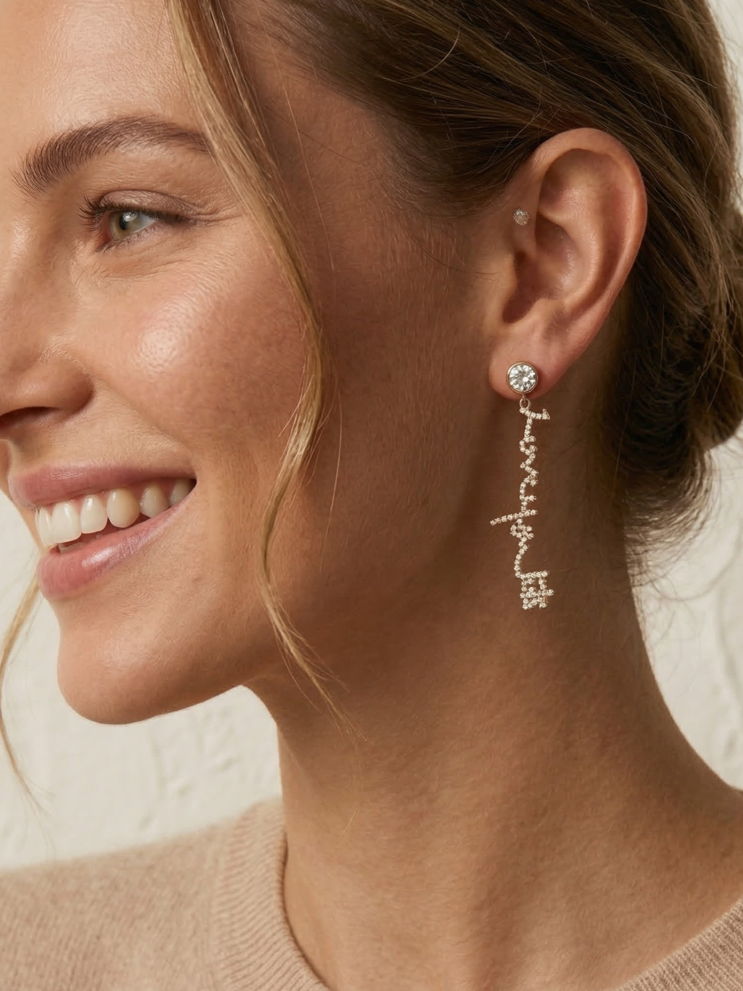 Custom handwritten earrings in 14K gold and diamonds