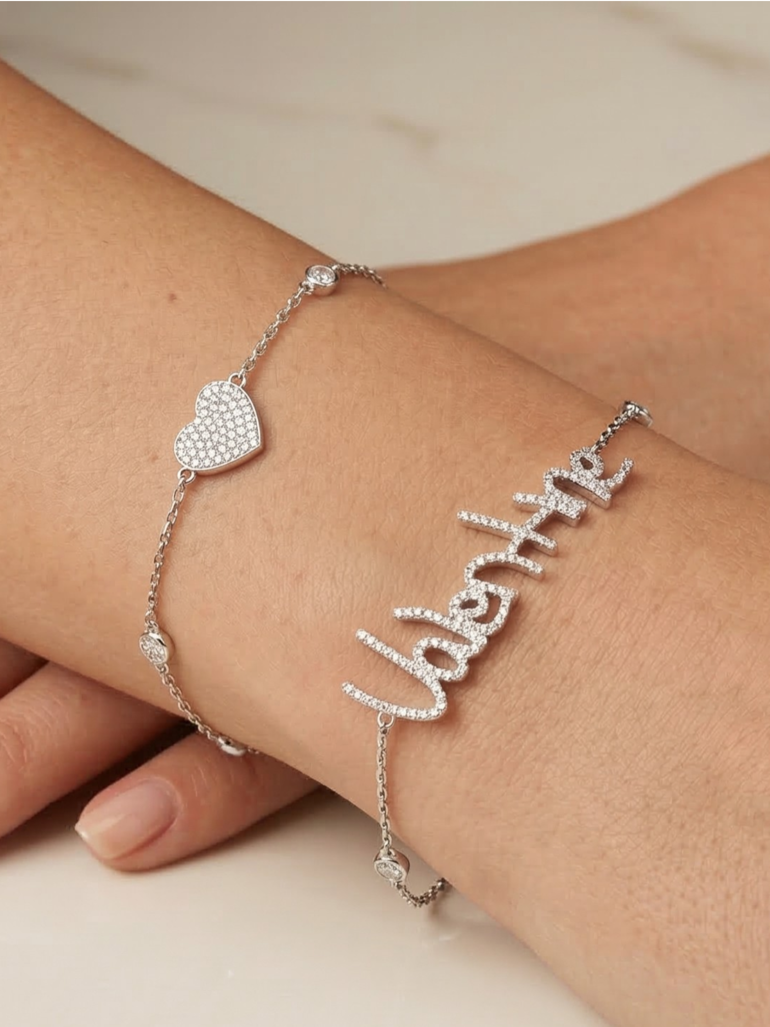 Custom handwritten bracelets in 14K gold and diamonds