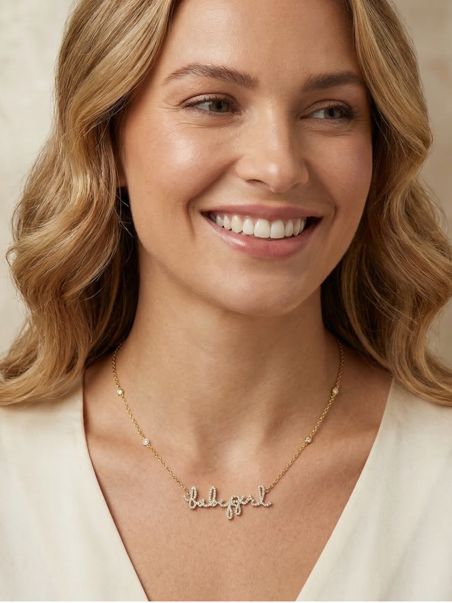 Custom handwritten necklaces, bracelets and earrings in 14K gold and pave diamonds