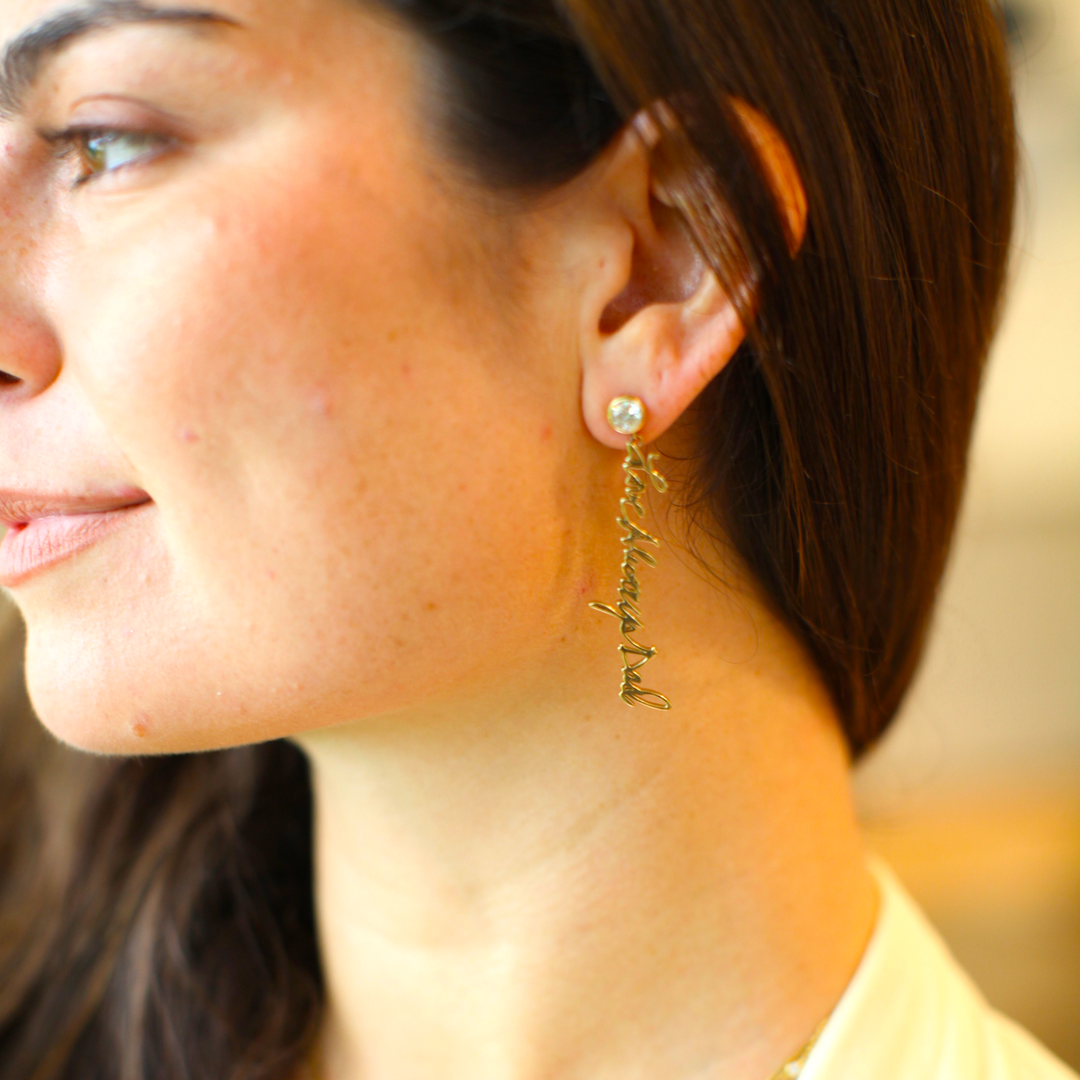 Your handwritten words gleam from ear to ear,
Your message in gold forever to hear 

Your handwritten earrings in thick 14K gold dangle from sparkling half carat diamond studs