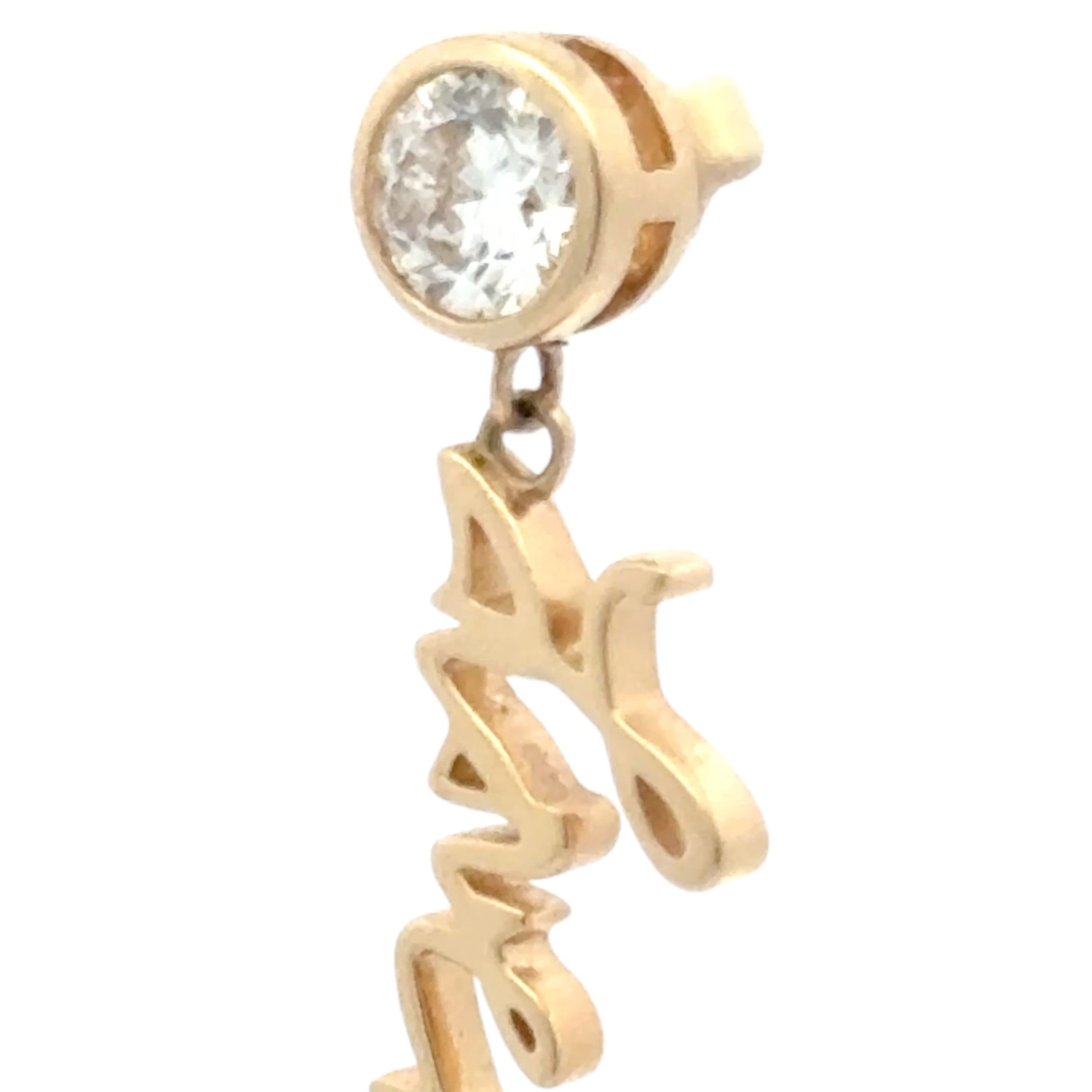 Your handwritten earrings in thick 14K gold dangle from sparkling half carat diamond studs