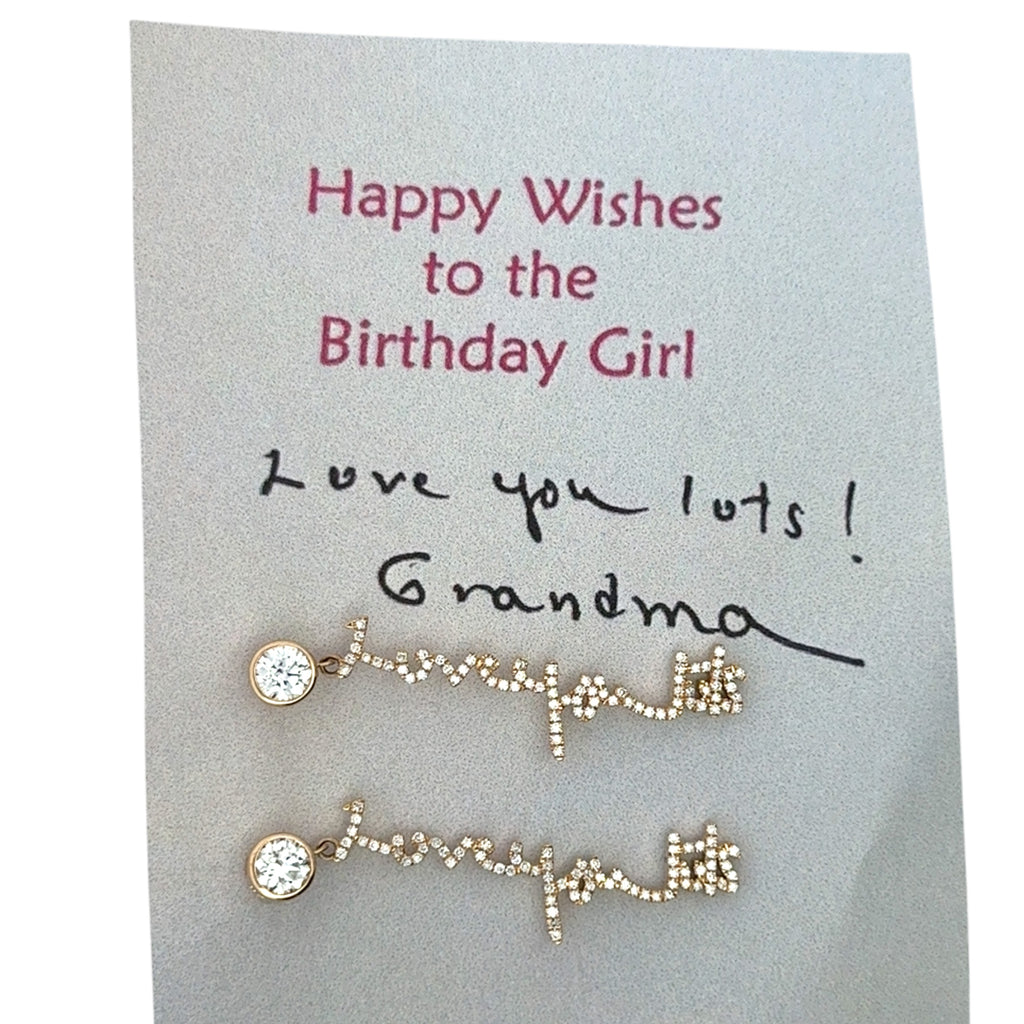 Your unique handwritten earrings in thick 14K gold, encrusted in pave diamonds, dangle from sparkling half carat diamond studs. Each piece we make is custom and we will ensure your approval of the CAD design prior to production.&nbsp; Separated words, letters and punctuation may require adjustments to create a continuous piece.