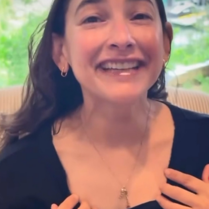 Social media influencer on Instagram, Facebook and TIkTok wearing and loving Written In Gold handwritten jewelry.  Real customer, real testimonial.  Five star review.