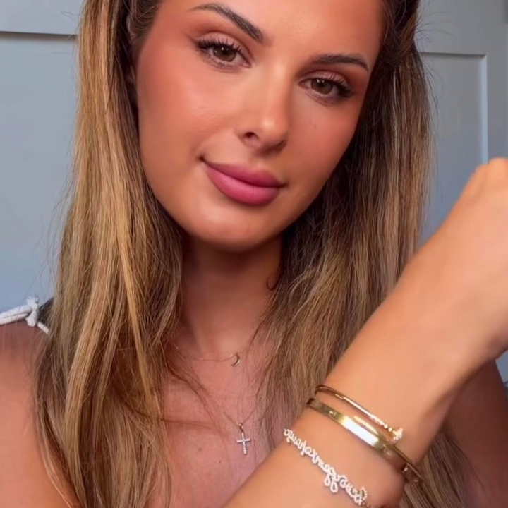 Social media influencer on Instagram, Facebook and TIkTok wearing and loving Written In Gold handwritten jewelry.  Real customer, real testimonial.  Five star review.