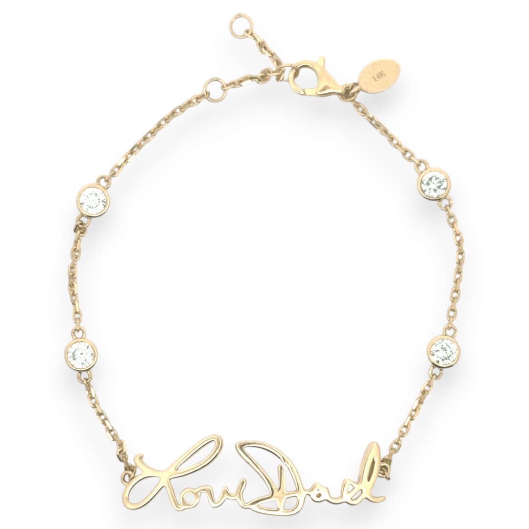 Your handwritten words worn delicately on the wrist,
There to clutch when you are most missed

14K yellow, white or rose gold
2mm thick
1.3mm diamond-cut chain w/ adjustable loops for 6, 6.5 &amp;amp; 7 inch length
Four ethically-sourced, bezel-set round diamonds (total weight: ~0.64 cts)
Pendant height and length vary by piece, and will be approved by you prior to crafting