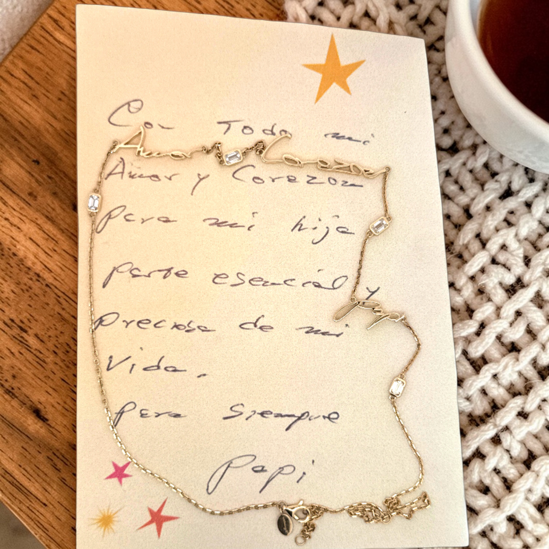 Three sets of handwritten words on display,
To help them feel closer when you are away

Your unique handwritten necklace featuring three different phrases, in thick 14K gold on an adjustable 18" diamond-cut chain including four sparkling emerald cut diamonds