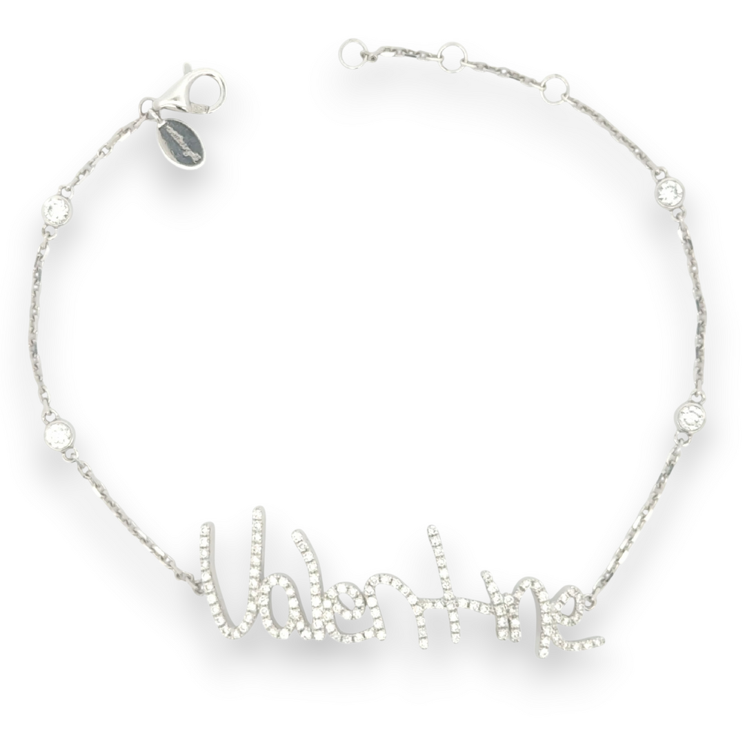 Your handwritten words worn delicately on the wrist,
There to clutch when you are most missed

Your unique handwritten bracelet in thick 14K gold, encrusted in pave diamonds, on an adjustable 7" diamond-cut chain featuring four sparkling bezel-set diamonds
