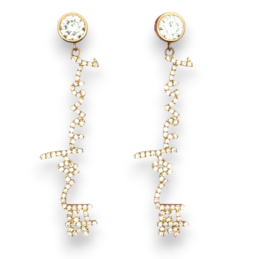 Your handwritten words gleam from ear to ear,
Your message in gold forever to hear

Your unique handwritten earrings in thick 14K gold, encrusted in pave diamonds, dangle from sparkling half carat diamond studs