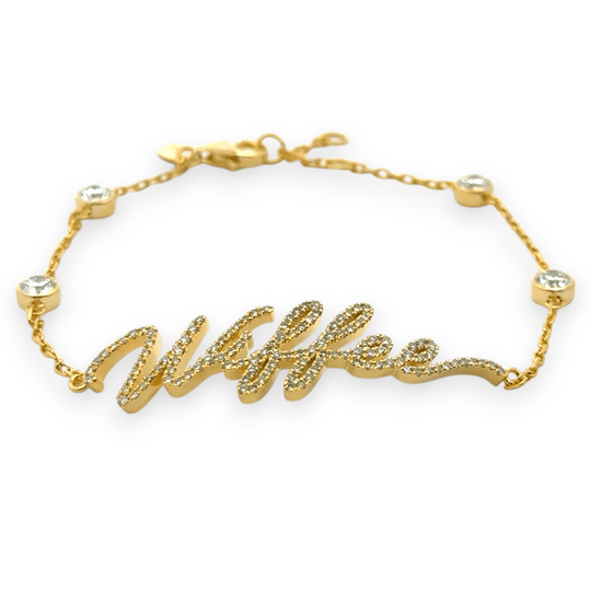 Your handwritten words worn delicately on the wrist,
There to clutch when you are most missed

Your unique handwritten bracelet in thick 14K gold, encrusted in pave diamonds, on an adjustable 7" diamond-cut chain featuring four sparkling bezel-set diamonds