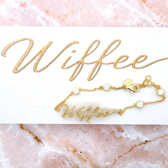 Your handwritten words worn delicately on the wrist,
There to clutch when you are most missed

Your unique handwritten bracelet in thick 14K gold, encrusted in pave diamonds, on an adjustable 7" diamond-cut chain featuring four sparkling bezel-set diamonds
