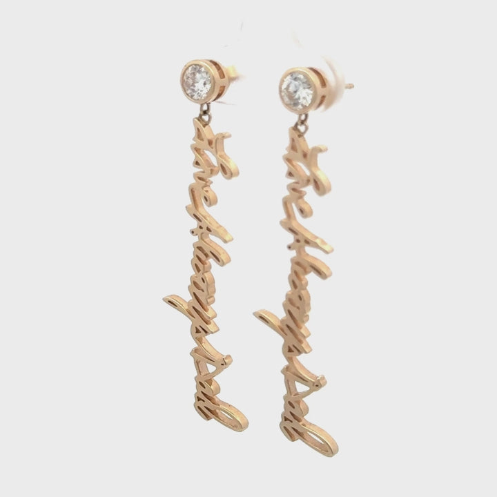 Your handwritten words gleam from ear to ear,
Your message in gold forever to hear 

Your handwritten earrings in thick 14K gold dangle from sparkling half carat diamond studs