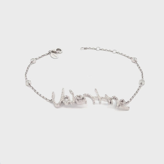 Your handwritten words worn delicately on the wrist,
There to clutch when you are most missed

Your unique handwritten bracelet in thick 14K gold, encrusted in pave diamonds, on an adjustable 7" diamond-cut chain featuring four sparkling bezel-set diamonds