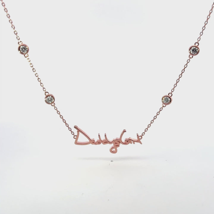Your handwritten words rest close to the heart,
To gaze upon and to hold when you are apart

14K yellow, white or rose gold
2mm thick
1.3mm diamond-cut chain w/ adjustable loops for 16, 17 &amp;amp; 18 inch length
Four ethically-sourced, bezel-set round diamonds (total weight: ~0.64 cts)
Pendant height and length vary by piece, and will be approved by you prior to crafting