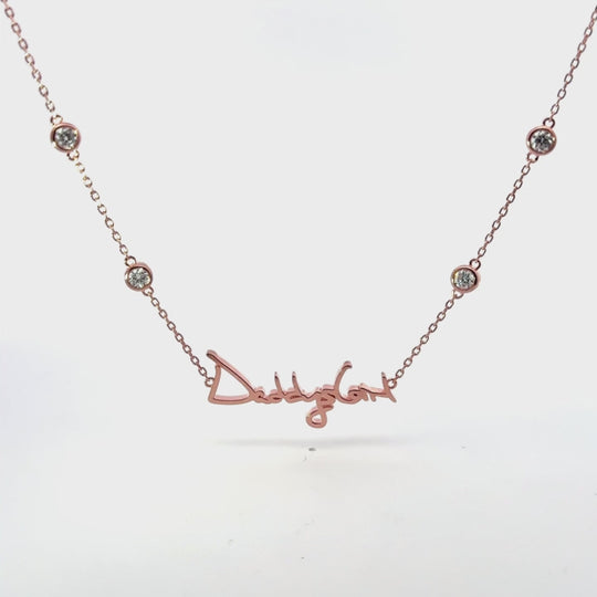 Your handwritten words rest close to the heart,
To gaze upon and to hold when you are apart

14K yellow, white or rose gold
2mm thick
1.3mm diamond-cut chain w/ adjustable loops for 16, 17 &amp;amp; 18 inch length
Four ethically-sourced, bezel-set round diamonds (total weight: ~0.64 cts)
Pendant height and length vary by piece, and will be approved by you prior to crafting